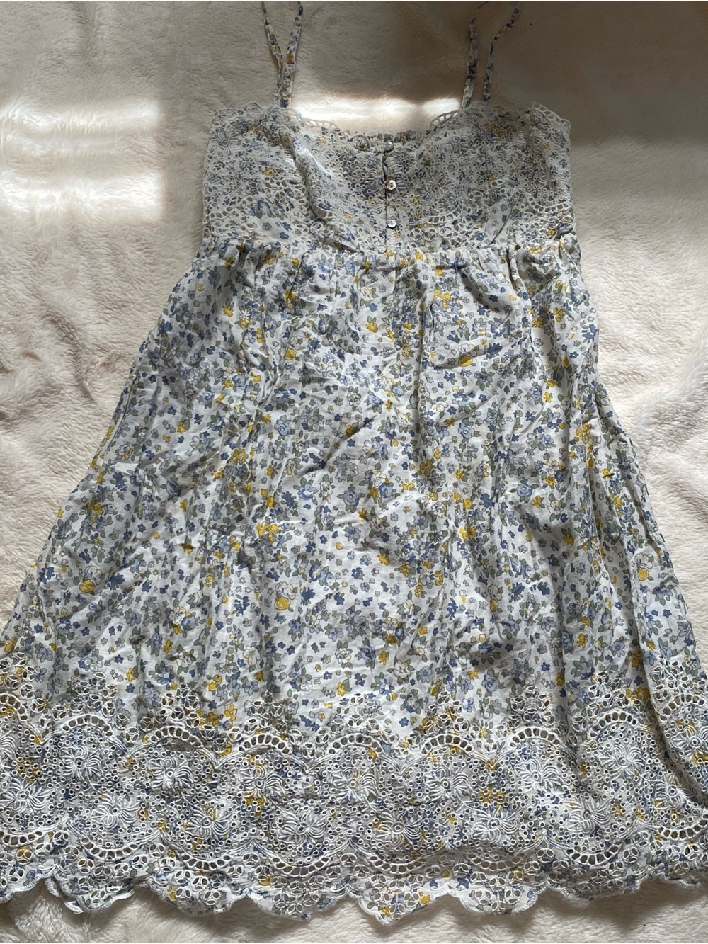 Yellow and white floral babydoll dress with lace trim